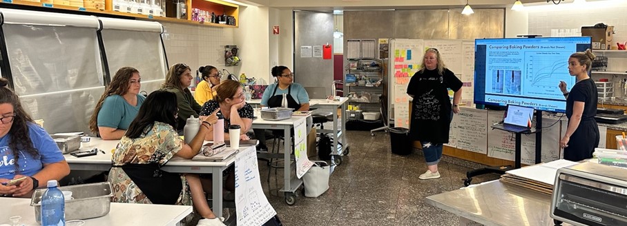 Kate Strangfeld (far right) and Shawn Boggs leading a middle school teacher workshop at the Harvard Science and Cooking Laboratory